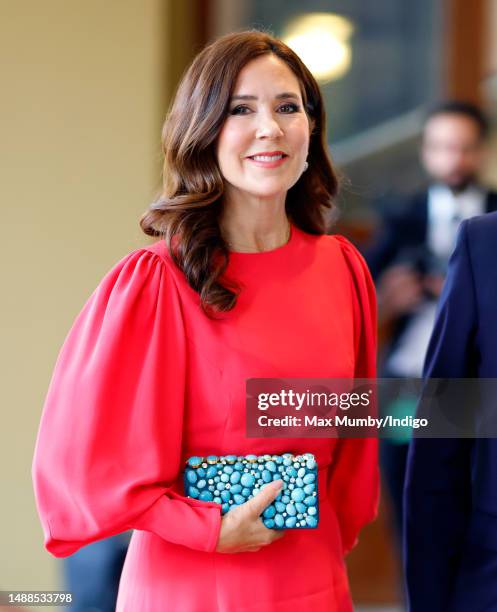 Crown Princess Mary of Denmark attends a reception at Buckingham Palace for overseas guests ahead of the Coronation of King Charles III and Queen...