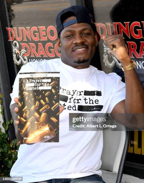 Jason R. Moore of the Netflix show 'Punisher' signs and promotes his Comic Book "A Prayer For The Hunted" on Free Comic Book Day 2023 held at Golden...