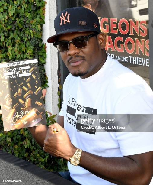 Jason R. Moore of the Netflix show 'Punisher' signs and promotes his Comic Book "A Prayer For The Hunted" on Free Comic Book Day 2023 held at Golden...