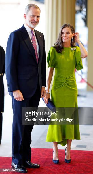 King Felipe VI of Spain and Queen Letizia of Spain attend a reception at Buckingham Palace for overseas guests ahead of the Coronation of King...