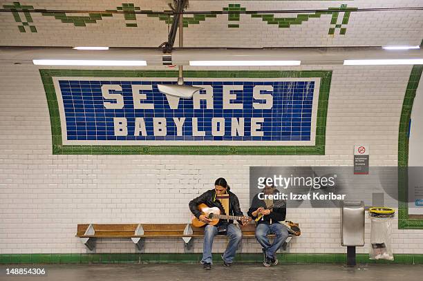 sevres babylone metro station. - subway bench bildbanksfoton och bilder