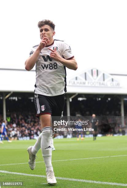 Tom Cairney of Fulham celebrates scoring the team's fourth goal during the Premier League match between Fulham FC and Leicester City at Craven...