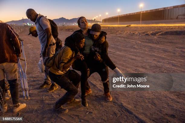 Venezuelan immigrants seeking asylum in the United States arrive to the U.S. Mexico border fence, hoping to be processed by U.S. Border agents on May...