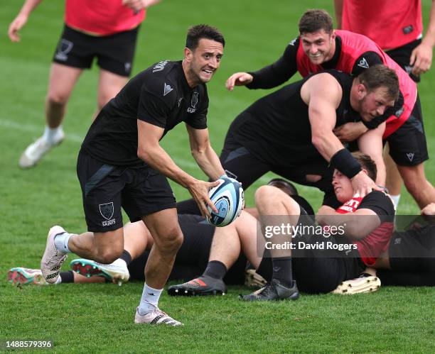 Alex Mitchell runs with the ball during the Northampton Saints training session held at Franklin's Gardens on May 09, 2023 in Northampton, England.
