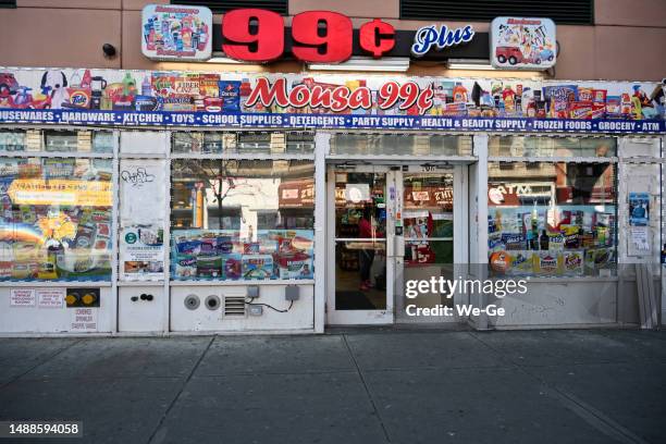 the 99 cent plus store at 102 w 116th st in new york harlem. - harlem stock pictures, royalty-free photos & images