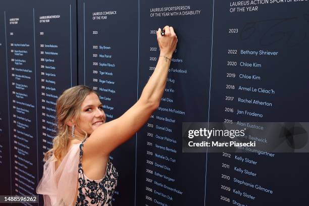 Catherine Debrunner signs the Winner's Wall for the "Laureus World Sportsperson of the Year with a Disability 2023" award during Montblanc presents...