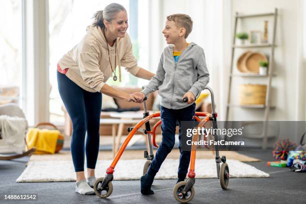 physical therapy at home - healthcare professional stock pictures, royalty-free photos & images