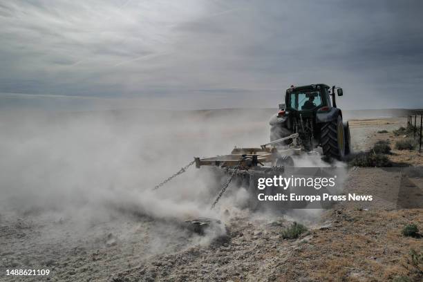 Tractor to plow the land in the Belchite field, on May 9 in Mediana de Aragon, Zaragoza, Aragon, Spain. The Union of Small Farmers in Aragon and the...