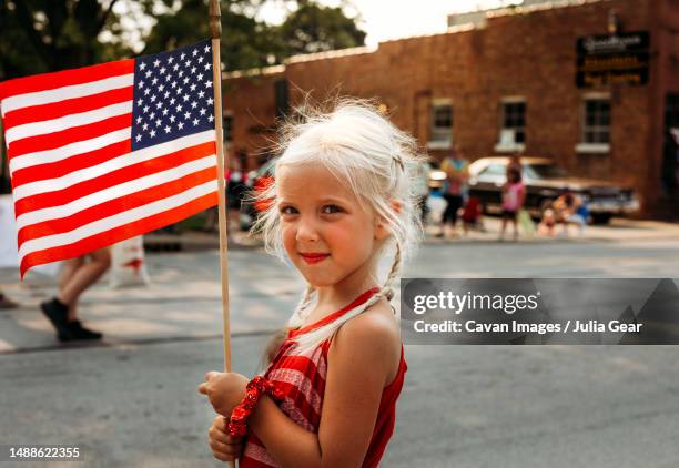 young girl at forth of july parade in northern indiana - scotland v united states stock pictures, royalty-free photos & images