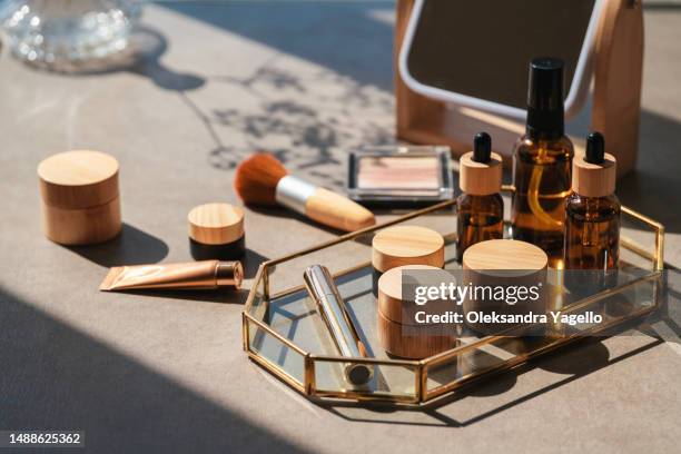 cosmetic products on table. natural organic skin care for face. beauty routine. - enzymes cosmetics foto e immagini stock