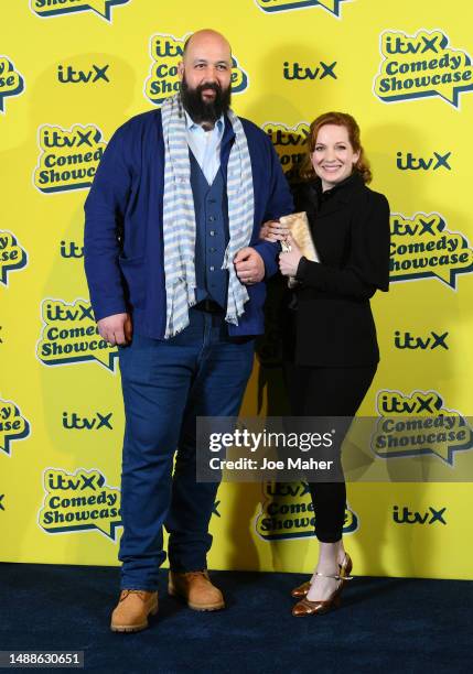 Youssef Kerkour and Katherine Parkinson attend the ITVX Comedy Showcase photocall at the Bike Shed Moto Co., on May 09, 2023 in London, England.