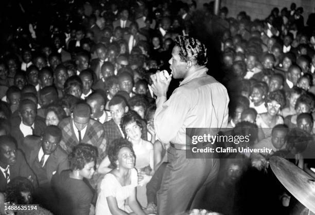 African American musician singing during an event at South Carolina State College in Orangeburg, South Carolina in the 1960s.