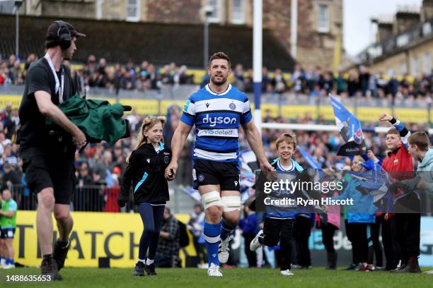 Dave Attwood of Bath Rugby leads the team out with their children, for the last time before they retire at the end of the season following an 18 year...