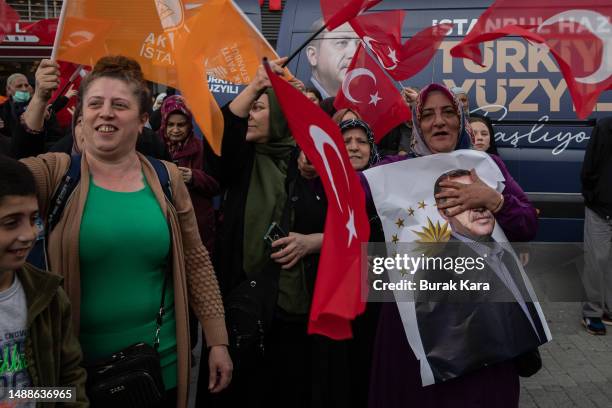 Woman holds Turkey's President Recep Tayyip Erdogan's poster during a campaign event on May 09, 2023 in Istanbul, Turkey. On May 14th, Turkey’s...