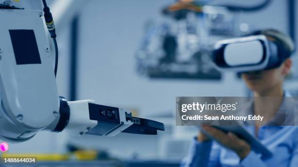 vr, robotics and engineering woman on tablet for futuristic research, electronics design or programming in industry 4.0. technician person in virtual reality, digital tech and automation machine - industry 4 0 stock pictures, royalty-free photos & images