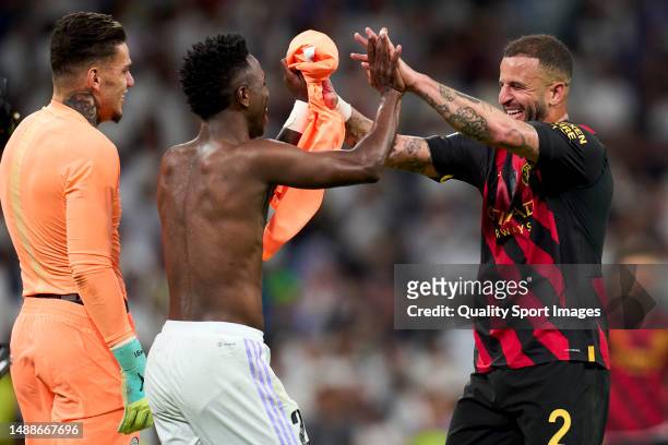 Vinicius Junior of Real Madrid salutes with Kyle Walker of Manchester City FC after the game during the UEFA Champions League semi-final first leg...