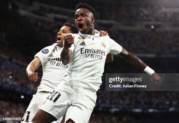 Vinicius Junior of Real Madrid celebrates after scoring the team's first goal during the UEFA Champions League semi-final first leg match between...