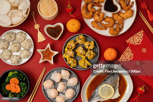 chinese new year festival table traditional lunar new year food,romania - chinese new year stock pictures, royalty-free photos & images