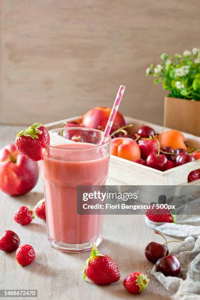 close-up of smoothie with strawberries and smoothie on table,romania - strawberry banana stock pictures, royalty-free photos & images