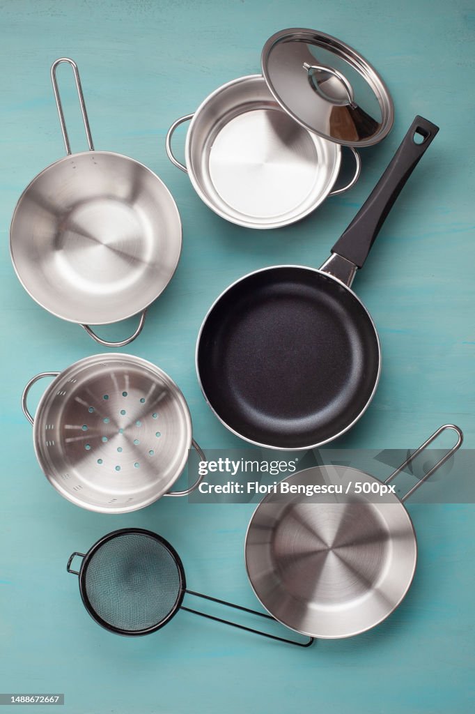 Set of kitchen metallic pans Mockup,Kitchen utensils,Recipe book and cooking classes concept,Romania