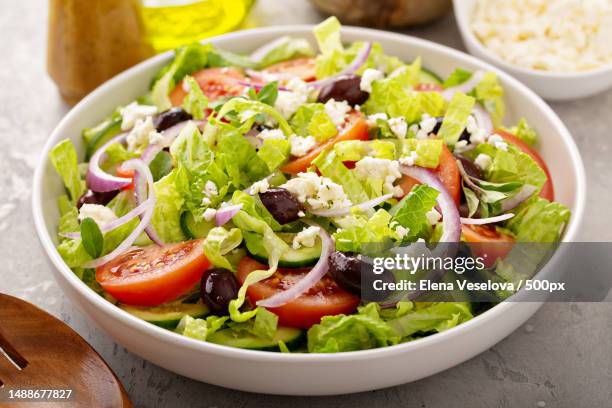 vegetarian greek salad with vinaigrette dressing - spicule stock pictures, royalty-free photos & images