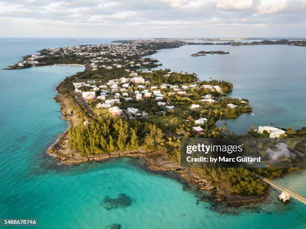 aerial view of flatts village at sunset, bermuda - bermuda aerial stock pictures, royalty-free photos & images