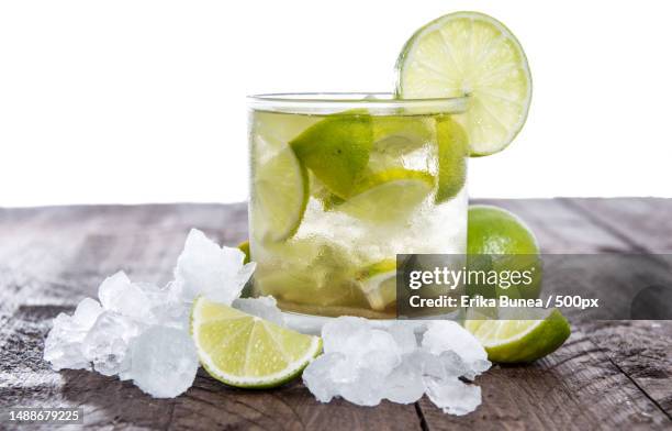 table with caipirinha isolated on white background,romania - crushed ice stockfoto's en -beelden