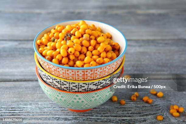 close-up of lentils in bowl on table,romania - buckthorn stock pictures, royalty-free photos & images