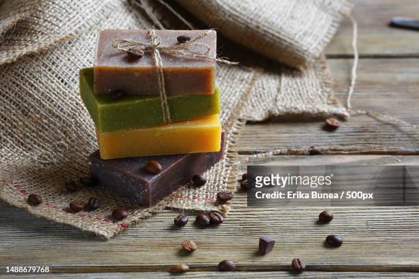 handmade soap with roasted coffee beans,toiletries on sacking,romania - homemade soap stock pictures, royalty-free photos & images
