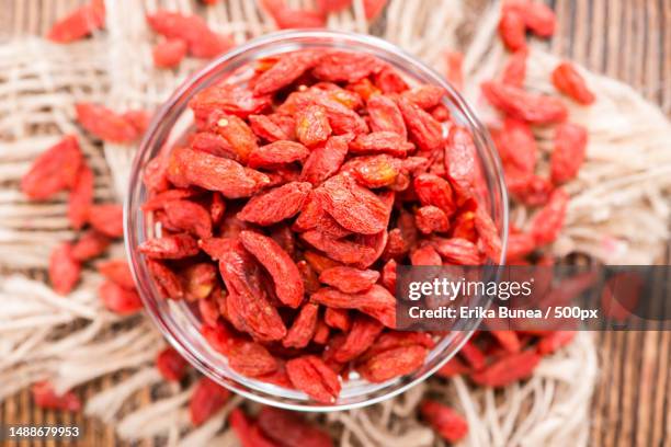 portion of ried goji berries also known as wolfberry,romania - wolfberry stock pictures, royalty-free photos & images