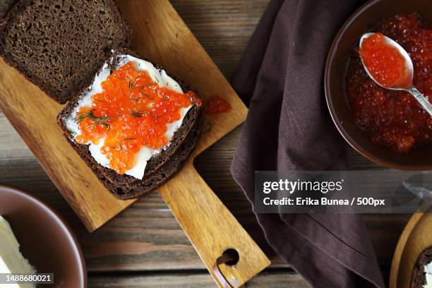 sandwich with caviar on the board,food,romania - canape stock pictures, royalty-free photos & images