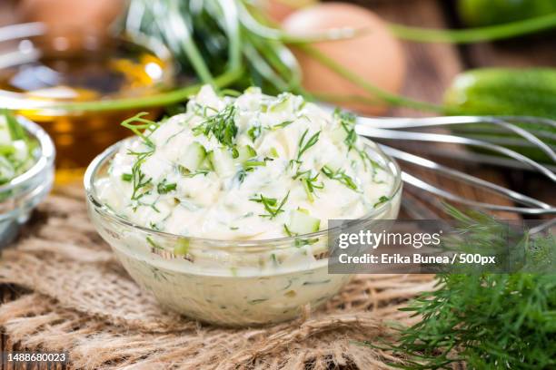 sauce remoulade homemade with fresh herbs on wooden background,romania - quark stock-fotos und bilder