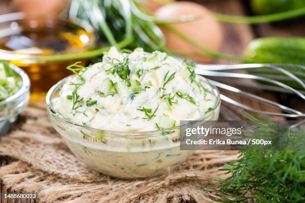 sauce remoulade homemade with fresh herbs on wooden background,romania - dill foto e immagini stock