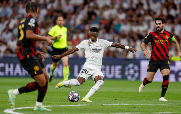 Vinicius Jr. Player of Real Madrid scores his team's goal during the UEFA Champions League semi-final first leg match between Real Madrid and...