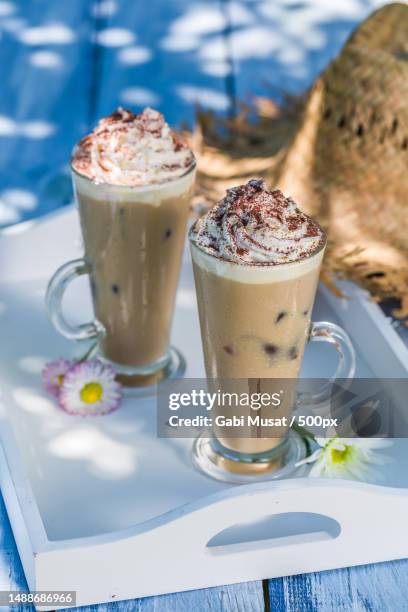 close-up of drinks on table - coffee frappe stock-fotos und bilder