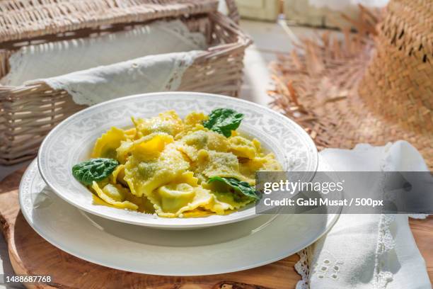 high angle view of pasta in plate on table - ravioli fotografías e imágenes de stock