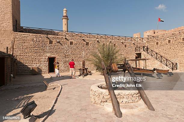 al fahidi fort museum, courtyard display, bur dubai. - bur al arab stock pictures, royalty-free photos & images