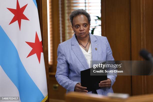 Chicago Mayor Lori Lightfoot arrives for a press conference where she announced that she has declared a state of emergency to help deal with the...