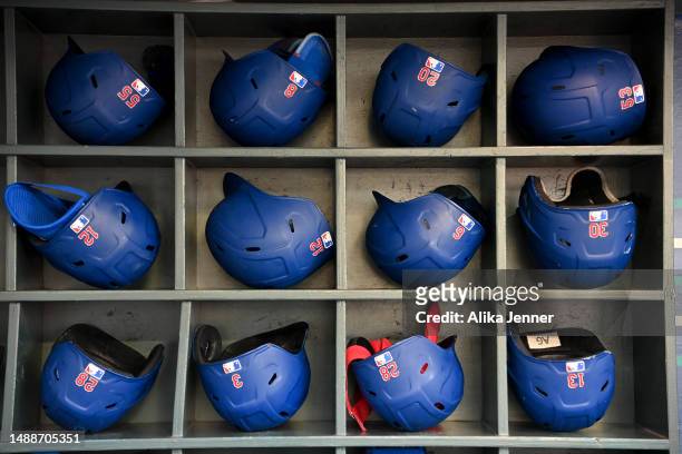 View of the Texas Rangers batting helmets in the dugout before the game against the Seattle Mariners at T-Mobile Park on May 09, 2023 in Seattle,...