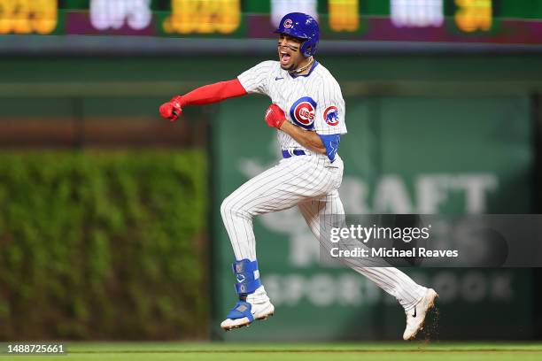 Christopher Morel of the Chicago Cubs celebrates after hitting a solo home run against the St. Louis Cardinals during the sixth inning at Wrigley...
