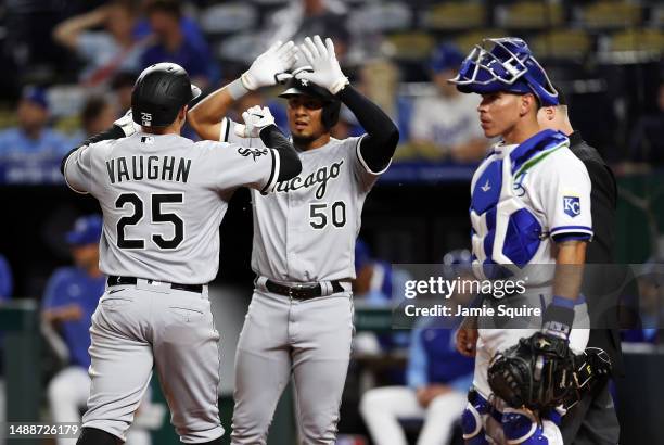 Andrew Vaughn of the Chicago White Sox is congratulated by Lenyn Sosa after hitting a two-run home run during the 6th inning of the game against the...