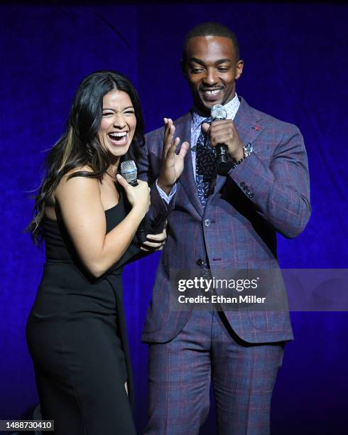 Gina Rodriguez and Anthony Mackie speak onstage to promote the upcoming film "Miss Bala" at the Sony Pictures Entertainment presentation during...