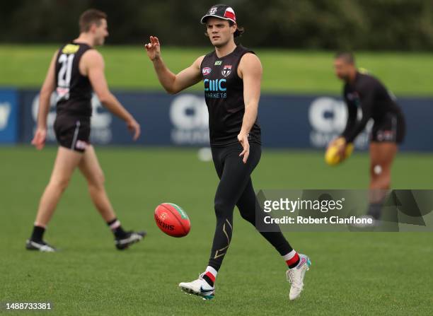 Hunter Clark of the Saints kicks the ball during a St Kilda Saints AFL training session at RSEA Park on May 10, 2023 in Melbourne, Australia.