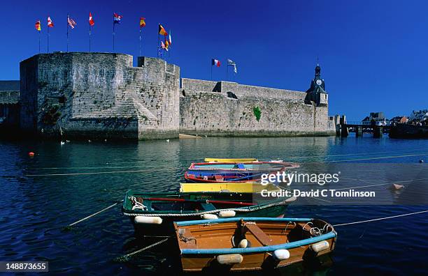 view from harbour to walled town (ville close). - concarneau stock pictures, royalty-free photos & images
