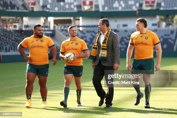 Taniela Tupou of the Wallabies, David Porecki of the Wallabies, Rugby Australia President Joe Roff and Angus Bell of the Wallabies pose during a...