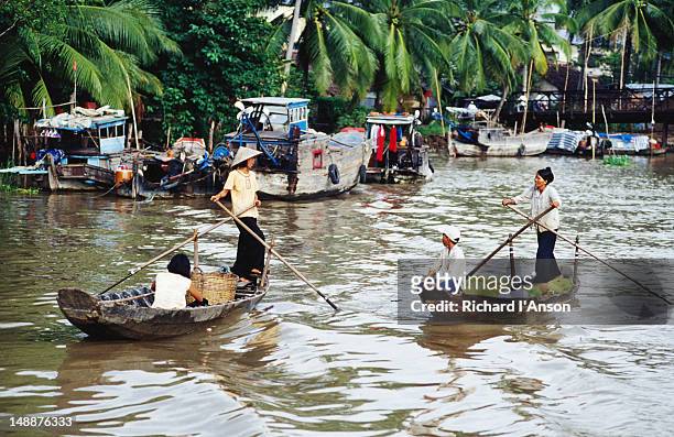 boats on mekong delta river near can tho. - delta i stock pictures, royalty-free photos & images