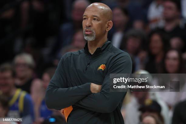 Head coach Monty Williams of the Phoenix Suns watches as his team plays the Denver Nuggets in the first quarter during Game Five of the NBA Western...