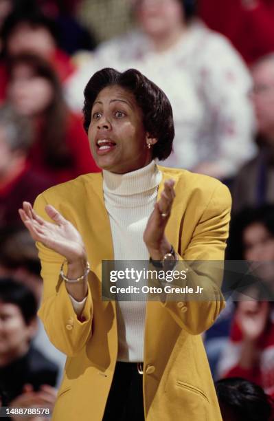 Cheryl Miller, Head Coach for the University of Southern California Trojans women's basketball team looks on from the sideline during the NCAA Pac-10...