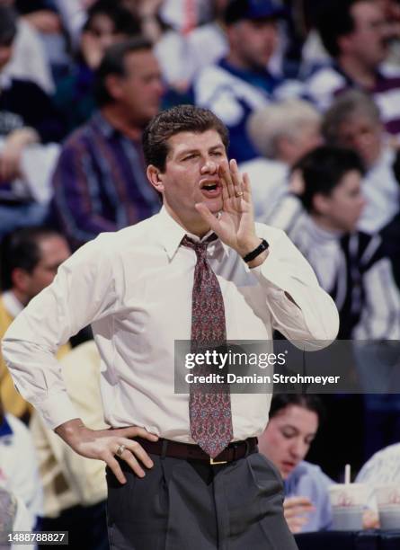 Geno Auriemma, Head Coach for the University of Connecticut Huskies women's basketball team calls out instructions during the NCAA Division I women's...