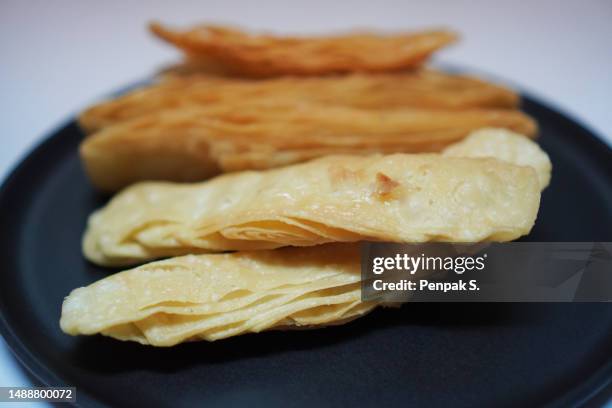 Misformed Roti Crispy Roti Photos and Premium High Res Pictures - Getty Images